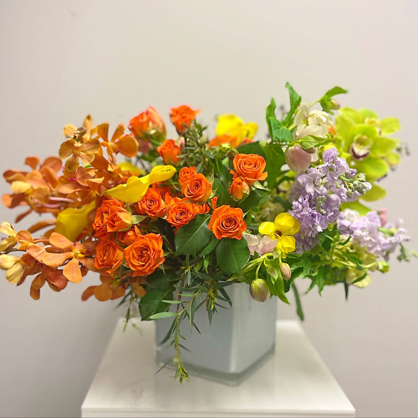 Orange Flower Bouquet In A Vase From Orchids & Spray Roses - Miami Flower Store Same-Day Delivery Fort Lauderdale Brickell Aventura Las Olas Hallendale Beach Hollywood Sunny Isles