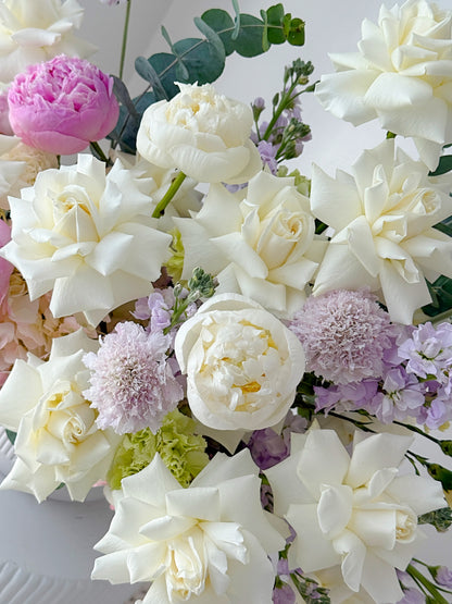 Centerpiece From White Flowers, Stock & Carnations In A Ceramic Vase - Miami Flower Store Same-Day Delivery Fort Lauderdale Brickell Aventura Las Olas Hallendale Beach Hollywood Sunny Isles