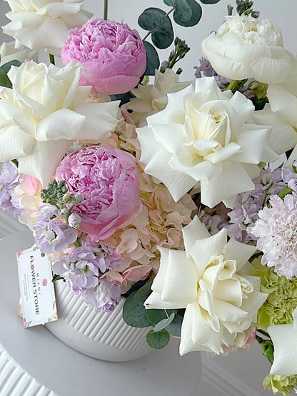 Centerpiece From White Flowers, Stock & Carnations In A Ceramic Vase - Miami Flower Store Same-Day Delivery Fort Lauderdale Brickell Aventura Las Olas Hallendale Beach Hollywood Sunny Isles