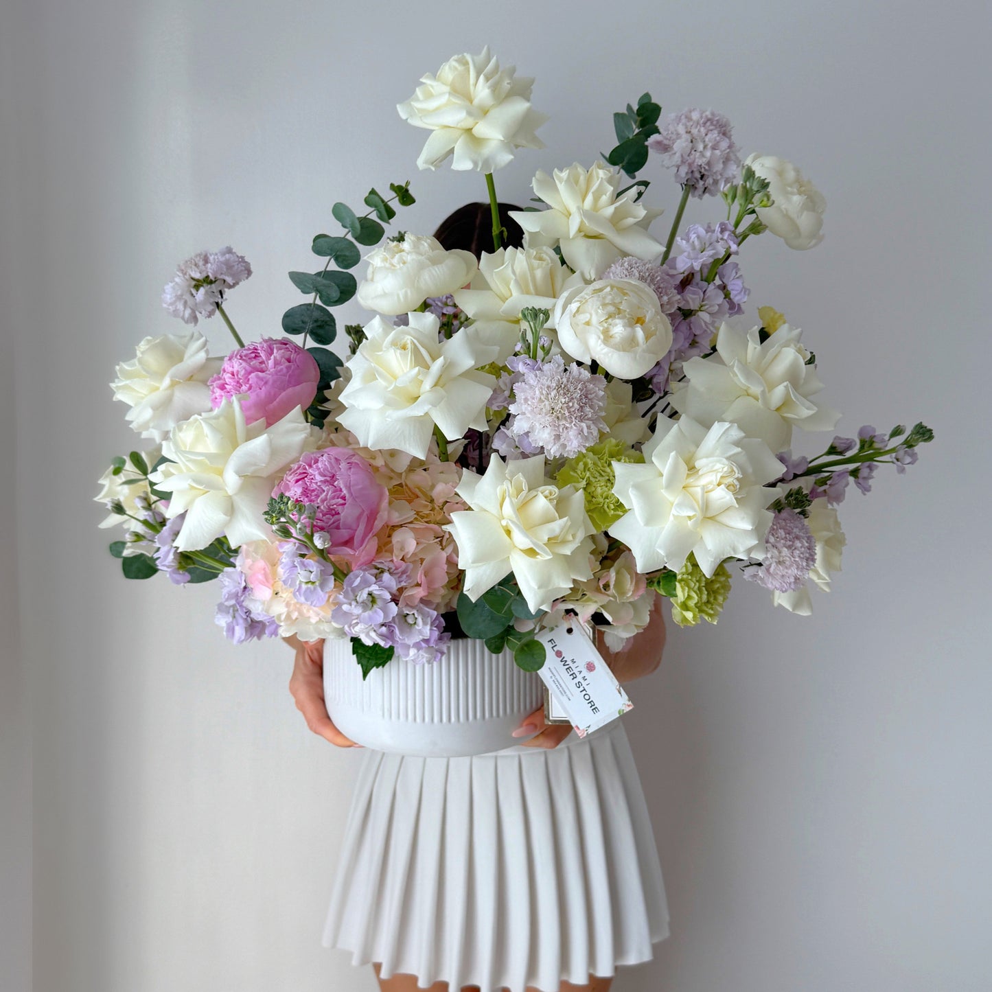 Centerpiece From White Flowers, Stock & Carnations In A Ceramic Vase - Miami Flower Store Same-Day Delivery Fort Lauderdale Brickell Aventura Las Olas Hallendale Beach Hollywood Sunny Isles