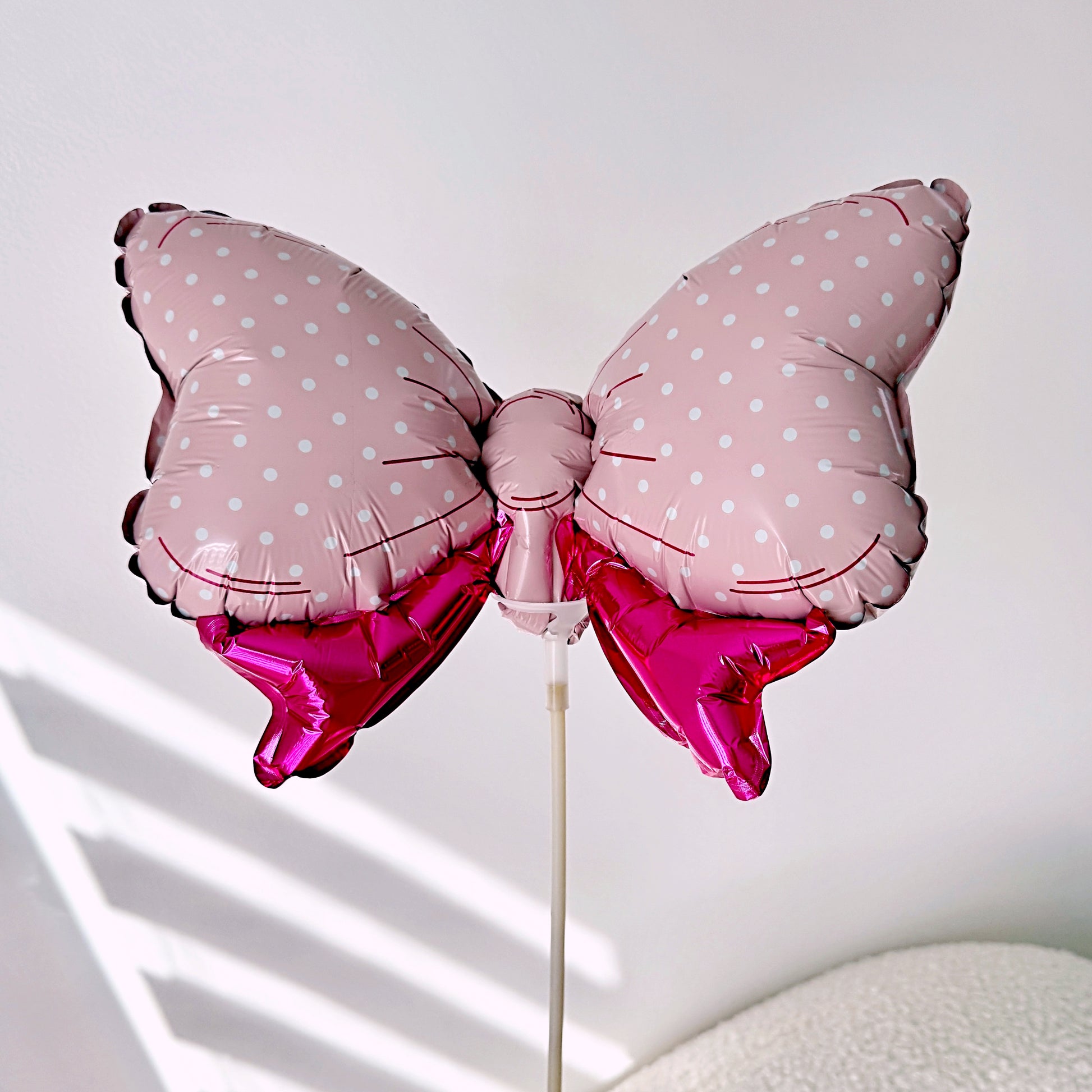 Small Pink Bow Shaped Metallic Foil Balloon On A Stick - 11''x 8'' - Miami Flower Store Same-Day Delivery Fort Lauderdale Brickell Aventura Las Olas Hallendale Beach Hollywood Sunny Isles