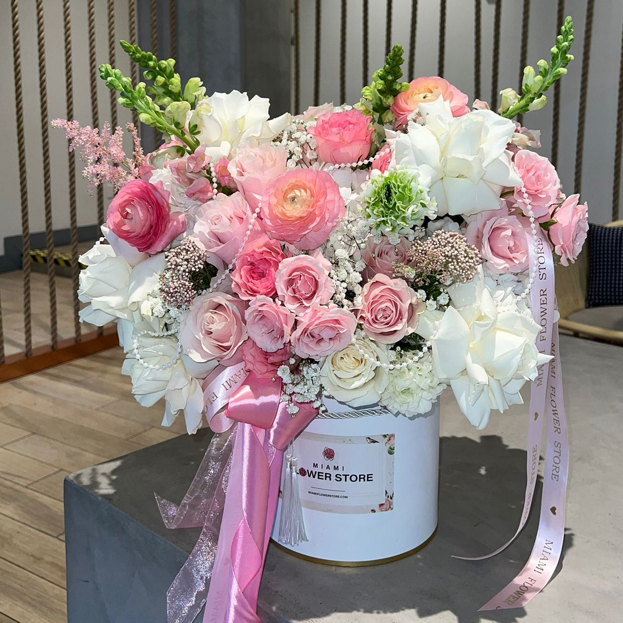 White And Peach Flower In A Box With Dragon, Astilbe, Hydrangea, Spray Roses, Ranunculuses, Carnations.